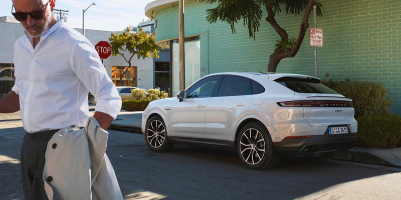 White Cayenne Coupe parked on a street